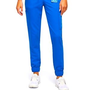 Jaanuu women’s enhanced jogger scrub pants. Galaxy blue. Size L